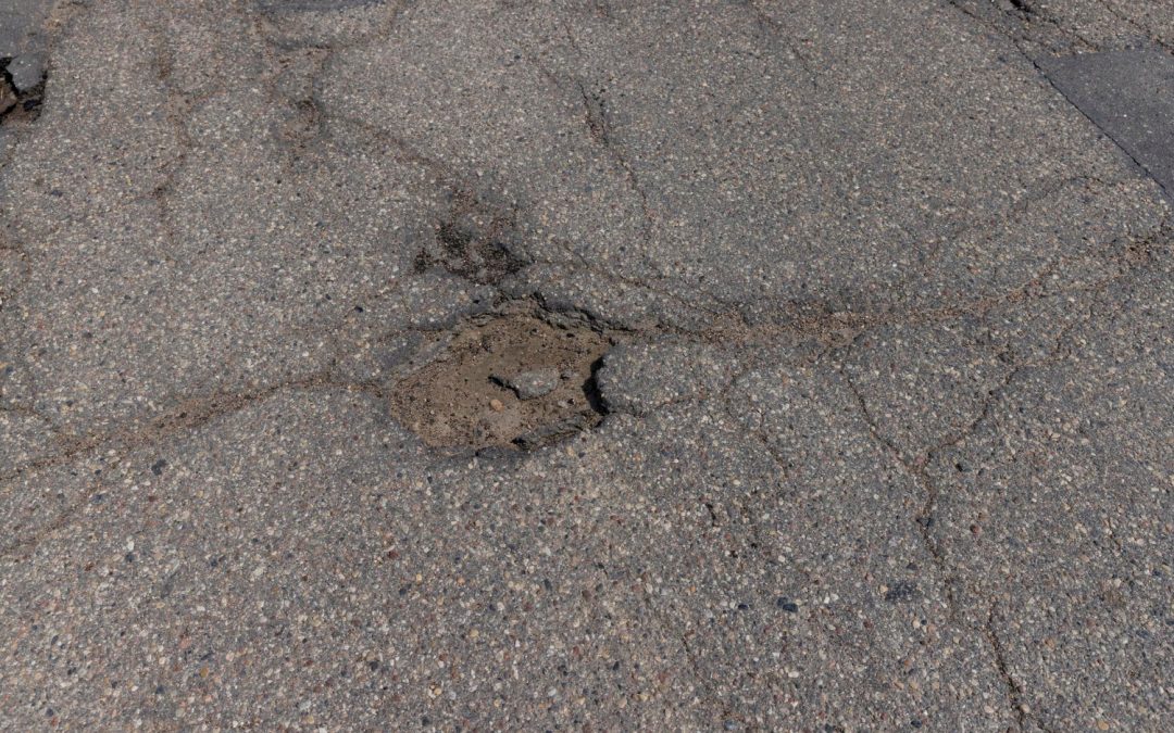 What Causes Potholes to Form in Asphalt—and How Can You Prevent Them?
